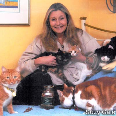 Lady Suzy Gale with several cats.