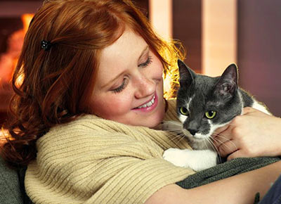 Person holding a cat